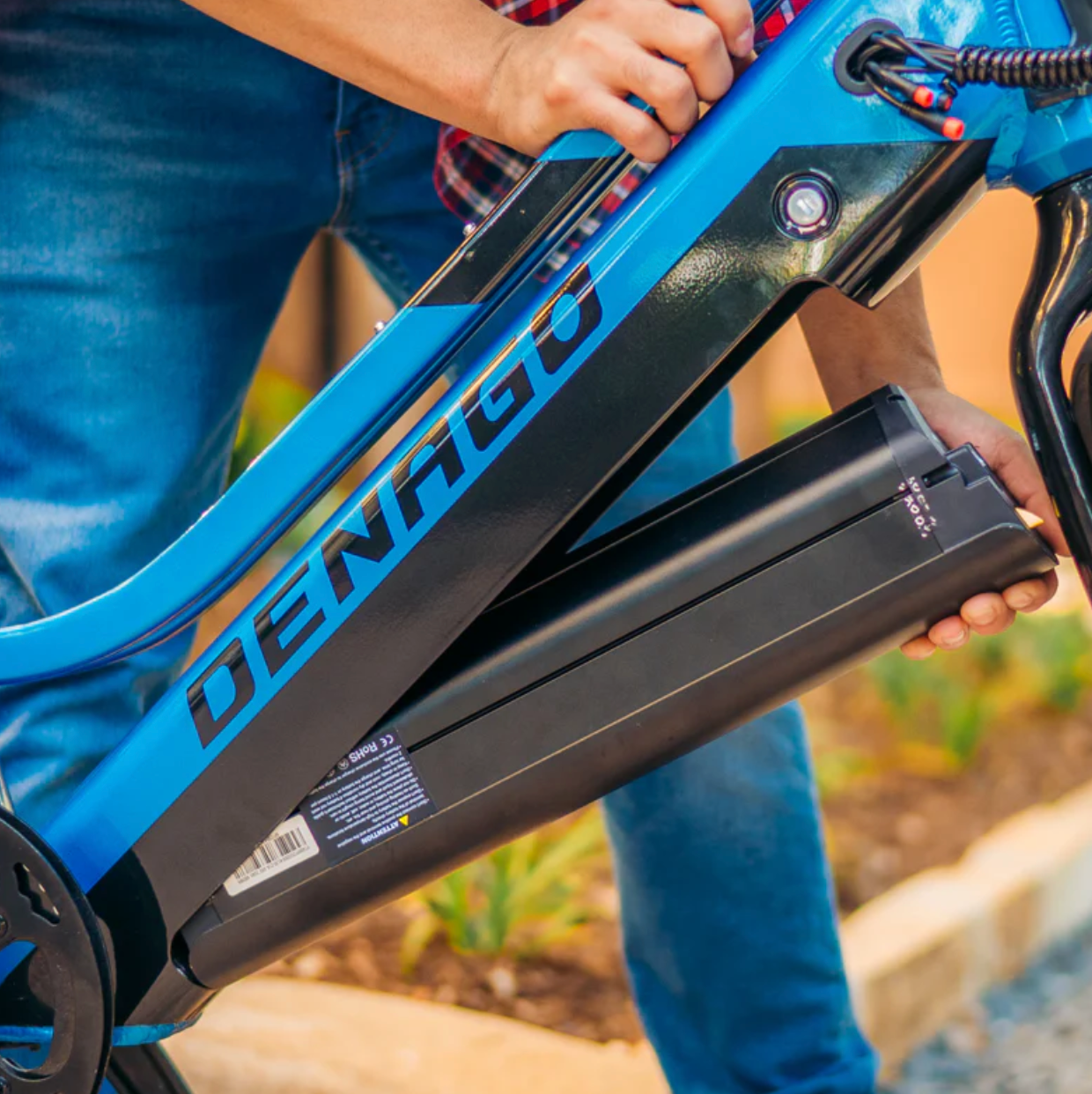 Close up picture of the battery being in the down post of the Denago Cargo LT Electric Bike.