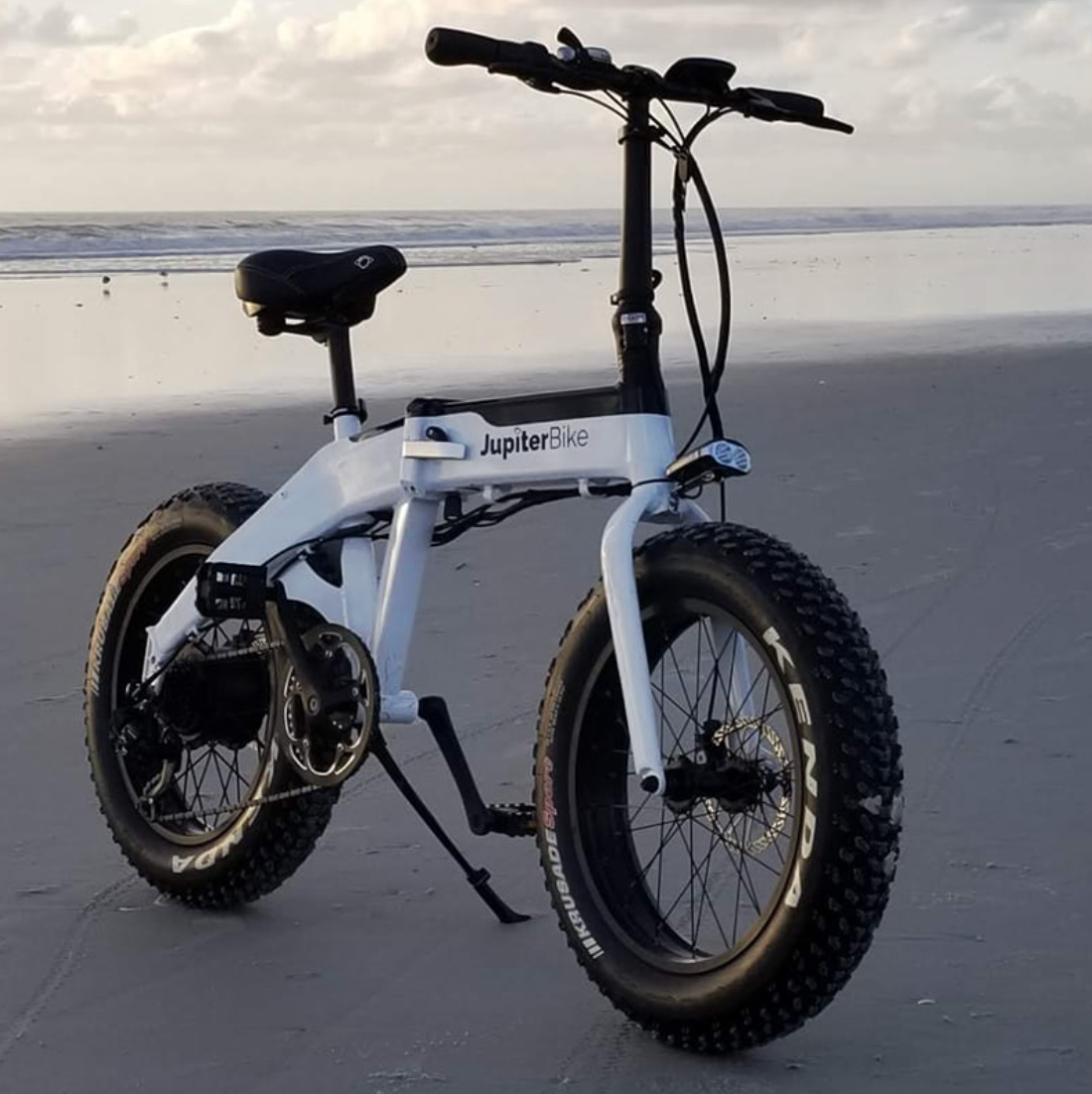 Jupiter Bike fat tire electric bike on a beach.