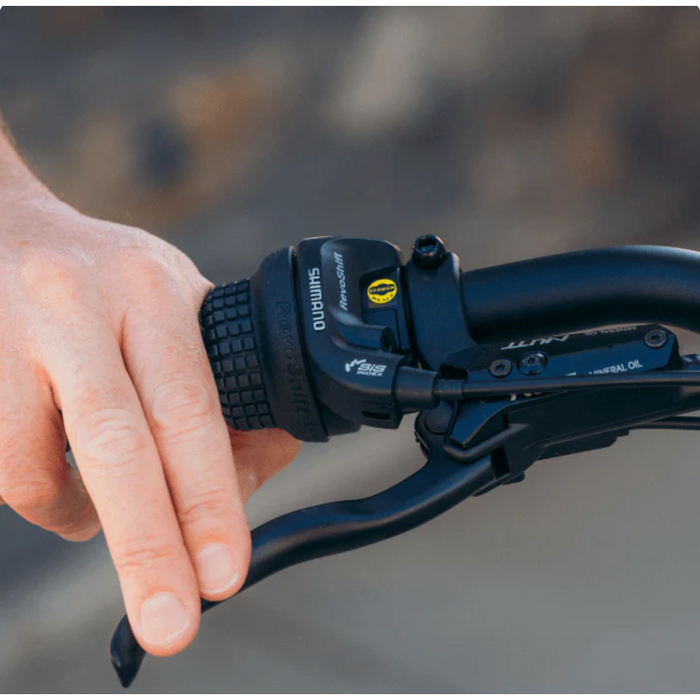 Hand on Shimano brake of the Denago Compact Cargo 1 eBike.