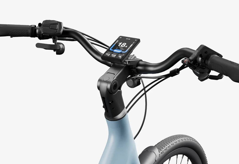 Close up view of the Urtopia Carbon Classic ST's cockpit on a Glacier Blue electric bike with a white background.