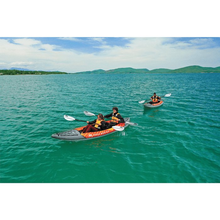 Aqua Marina Memba Touring Inflatable Kayaks together on a lake.