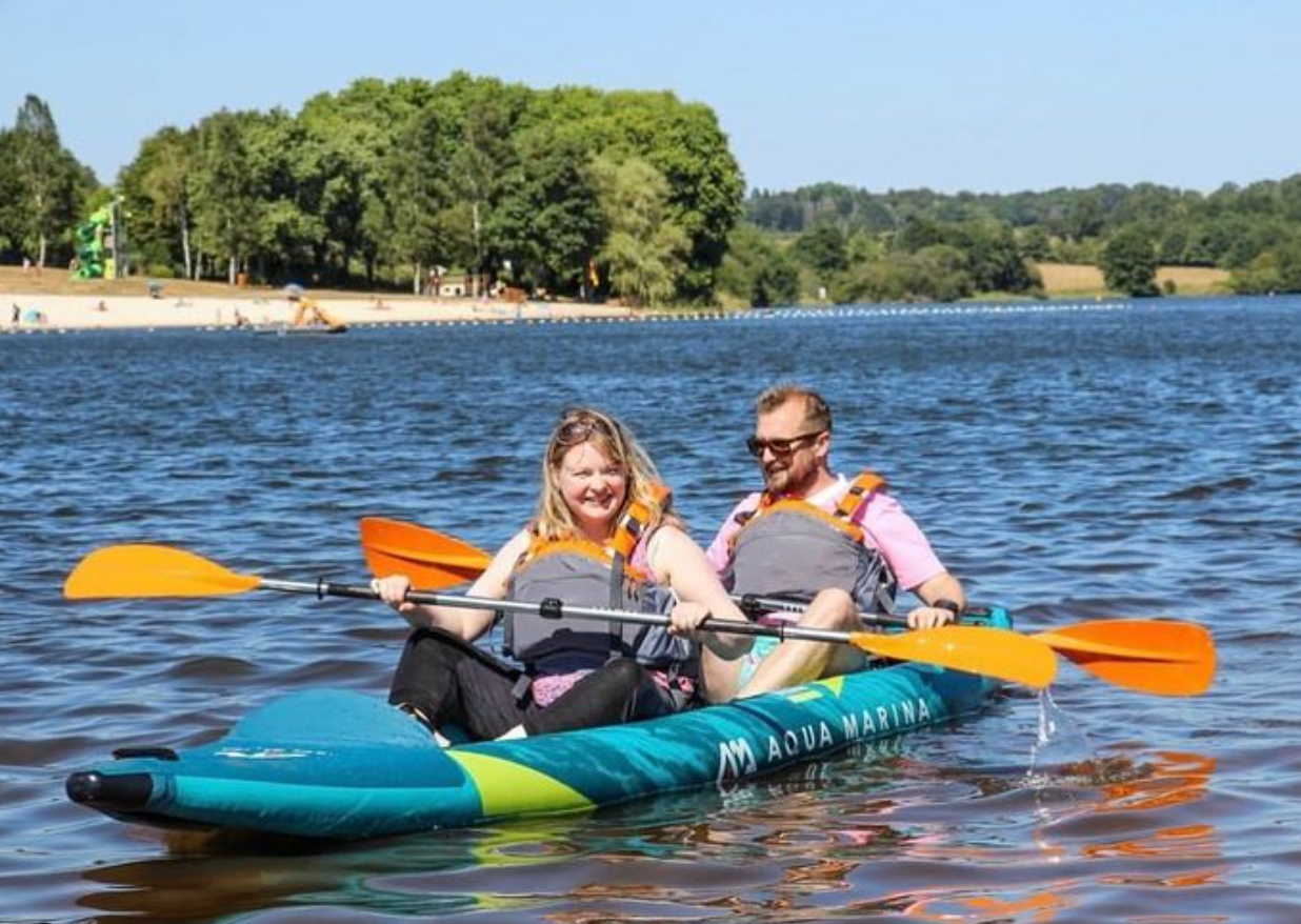 A couple paddling on the water in the Aqua Marina Steam Inflatable Kayak.