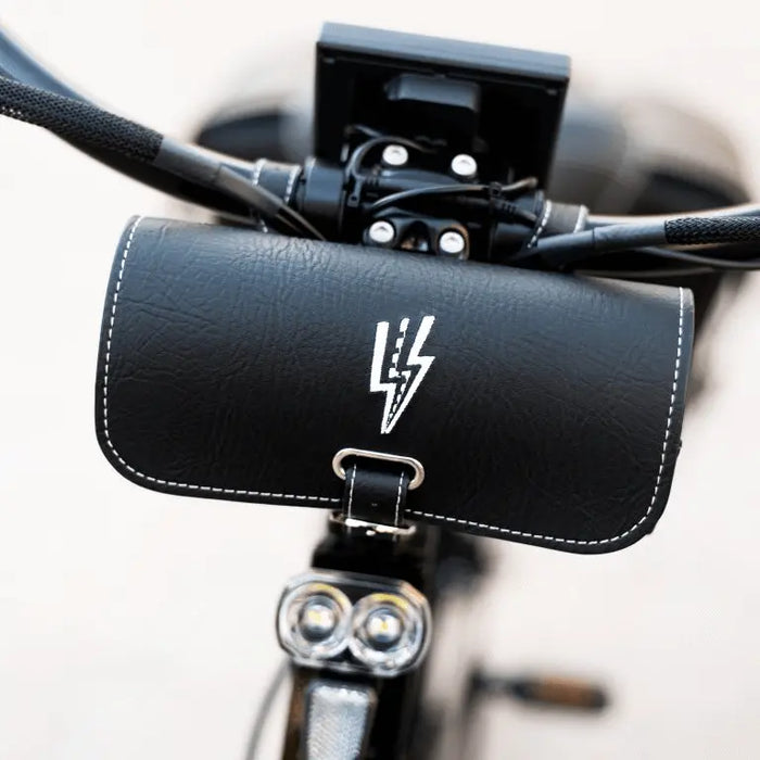 Black EBC Pouch on front of bike.