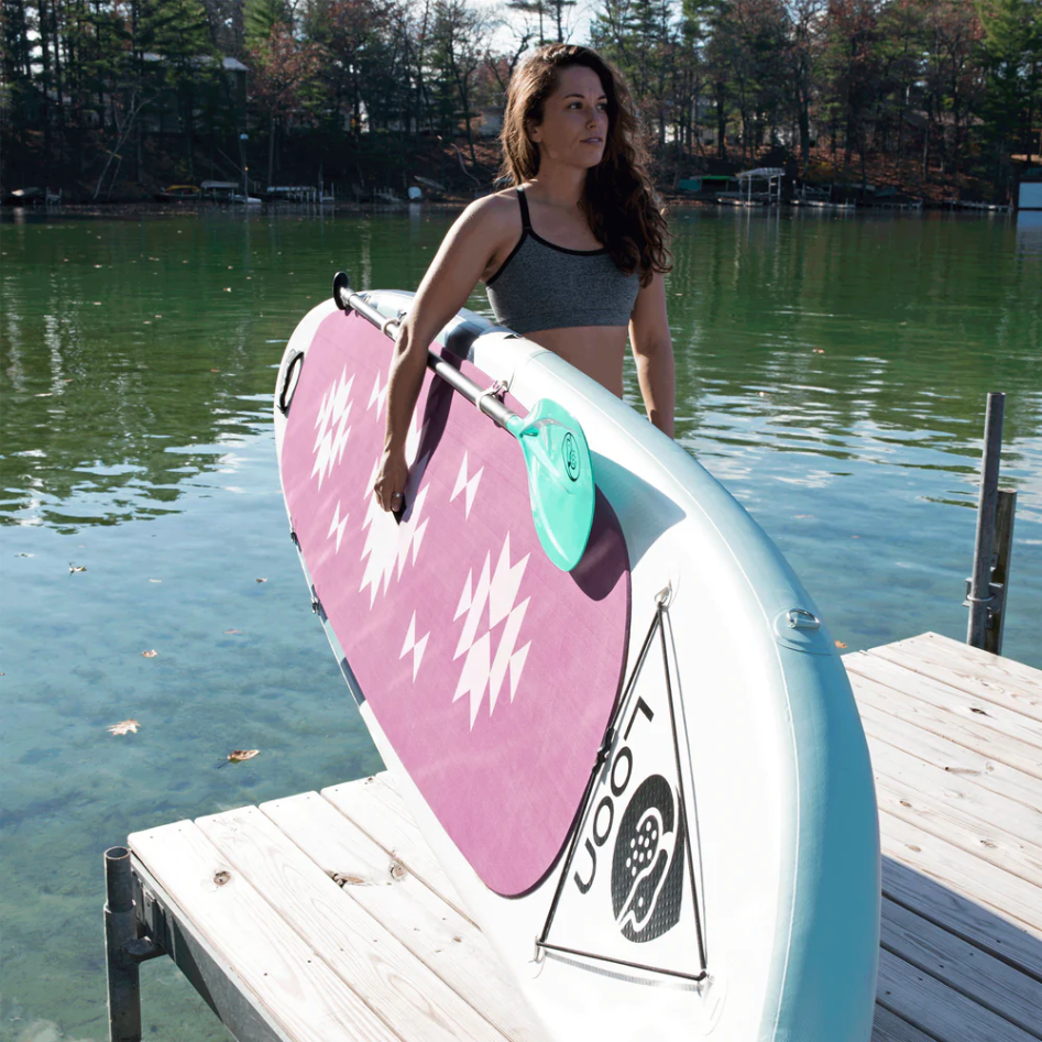 Girl on dock with Loon Paddle Company All-Around iSUP.