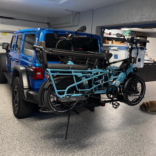 Lectric XPedition2 Cargo eBikes on a Hollywood Racks Sport Rider bike rack in a garage.
