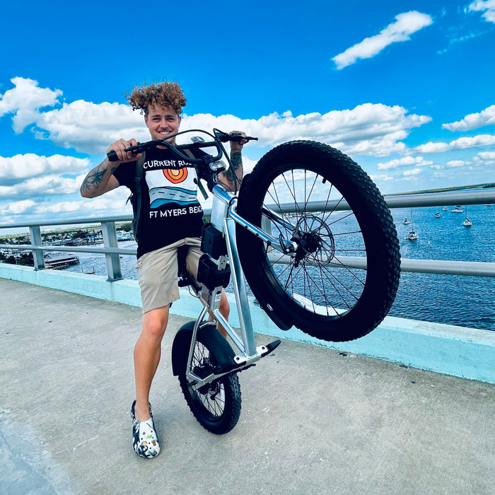 Guy on a JackRabbit MG Renegade eBike on Fort Myers Beach Bridge.