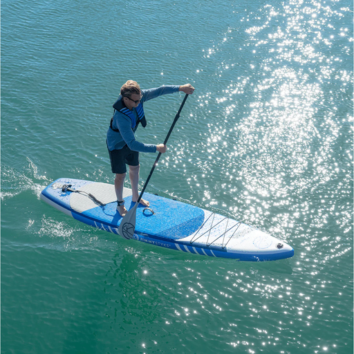 Guy riding the Jimmy Styks Strider on the water with matching life jacket on.