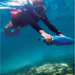 Jimmy Styks Sea Scooter with snorkler propelling under water. 