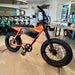 Juiced Scrambler Hardtail eBike in Orange Juice at Current Riders in Fort Myers Beach