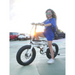 Girl on Defiant fat tire folding ebike from Jupiter Bike. 