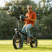 Guy with boots on a Lectric XP Step-Thru 3.0 Black Long-Range eBike.