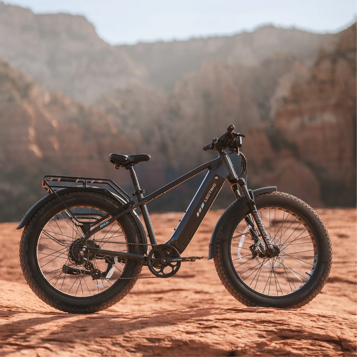 Lectric XPeak Step-Over 2.0 Electric Bike parked in the desert. 