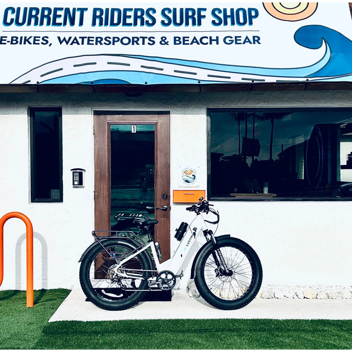Lectric XPeak 2.0 in front of Current Riders in Fort Myers Beach, Florida.