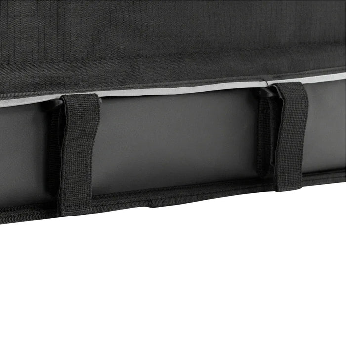 Bottom of Lectric's Small Pet Carrier with black velcro straps to secure it, shown on a white background