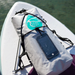 The Loon Paddle Company 15 Liter Dry Bag on the front of a SUP while out on the water.