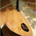 Loon Paddle Company Carbon & Bamboo Loon Paddle Laying On Top Of Board