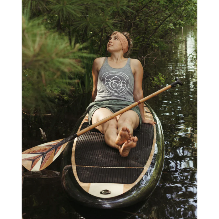 Loon Paddle Company Carbon & Bamboo Feather Paddle Girl Sitting On SUP With Paddle Across Her