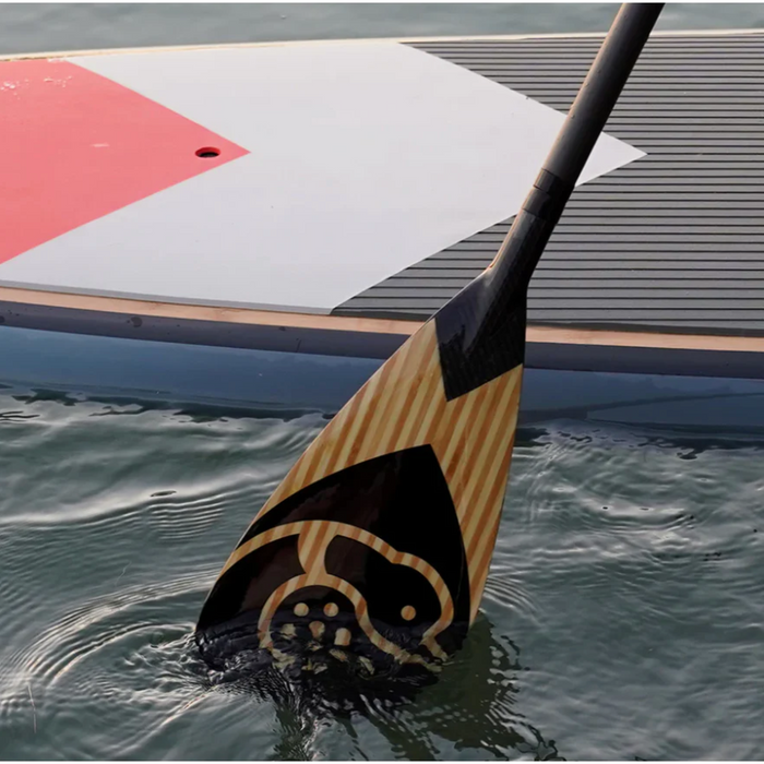 Loon Paddle Company Carbon & Bamboo Superbird Paddle Being Used with SUP In Water