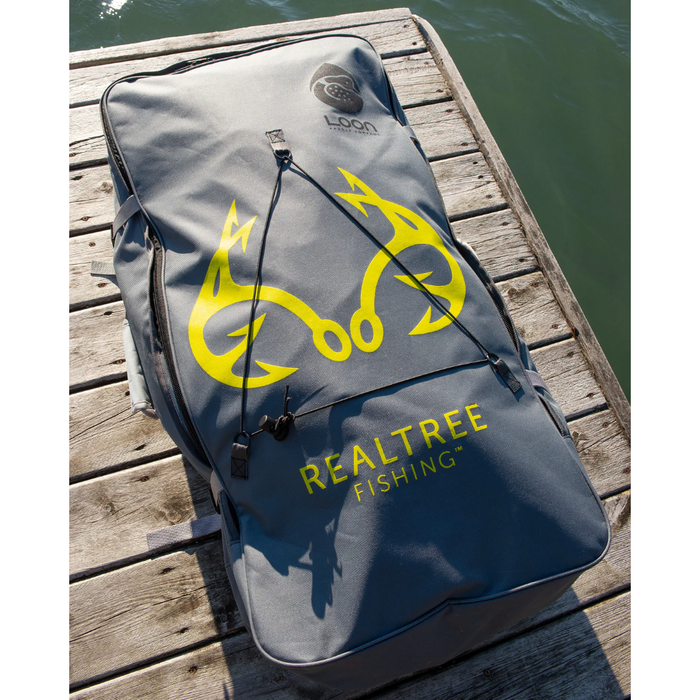 The gray carrying backpack that comes with the Loon Paddle Company REALTREE Fishing iSUP.