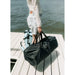 ParadisePad Inflatable Lake Chair deflated and folded in its carry bag