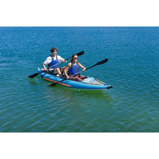 Couple paddling the Spinera Tenaya Kayak 120 out on the water.