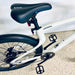 Urtopia Carbon 1 Pro eBike with black seat on a light background.