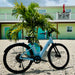 Urtopia Carbon Step-Thru ebike parked in front of Fort Myers Beach rental house First Mango.