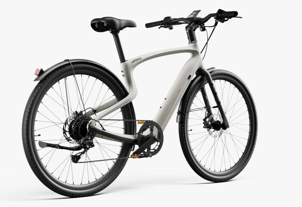Urtopia Carbon Classic electric bike in creme from the back on a white background.