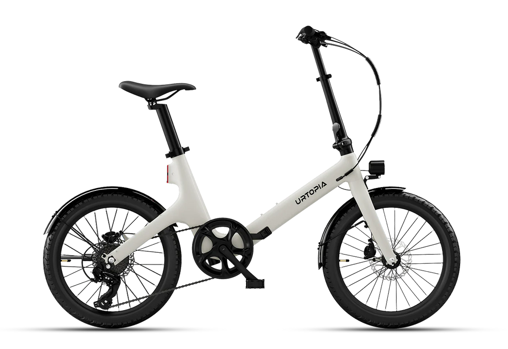 An Urtopia Carbon Fold ST folding electric bike in Creme with with a step-through frame, black saddle, and black tires, shown from a side profile on a clean white background.