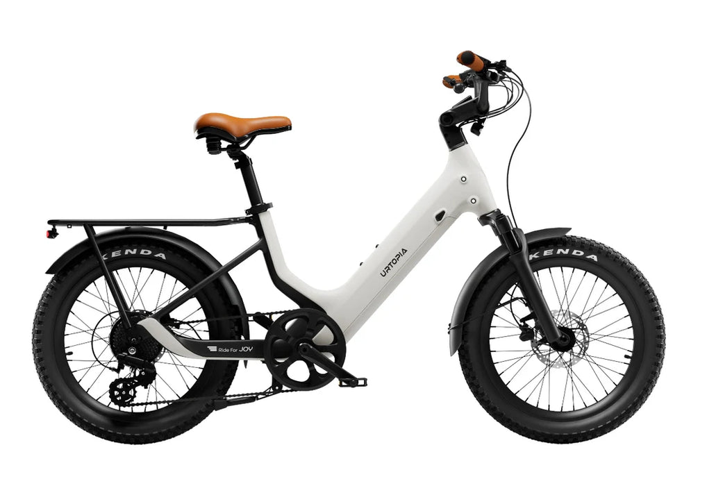 Urtopia Joy Carbon crreme ebike with brown seat on a white background