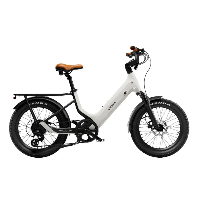 Urtopia Joy Carbon crreme ebike with brown seat on a white background