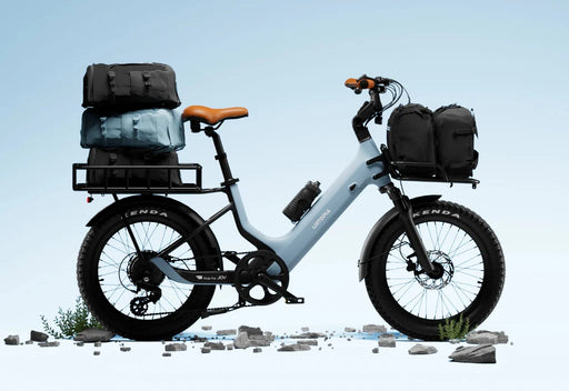 Urtopia Joy Carbon e-bike in glacier blue with cargo bags on a clear blue sky background