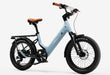 Glacier blue Joy Carbon electric bike by Urtopia with black rear rack and tires on a white background