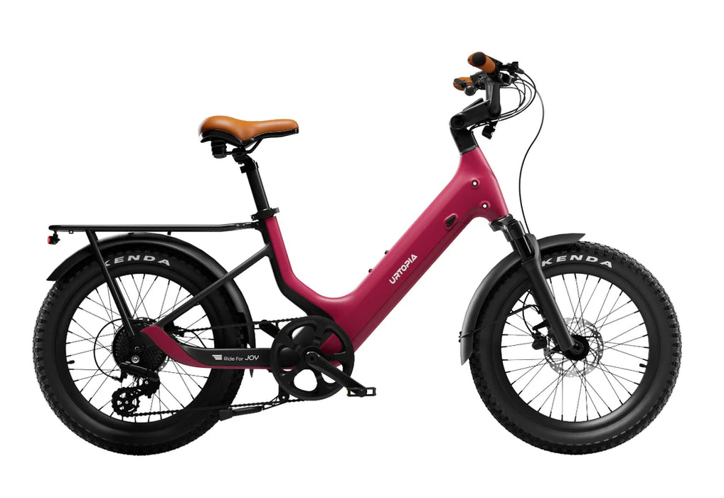 Rose Red Urtopia Joy Carbon e-Bike with Kenda tires on a white background